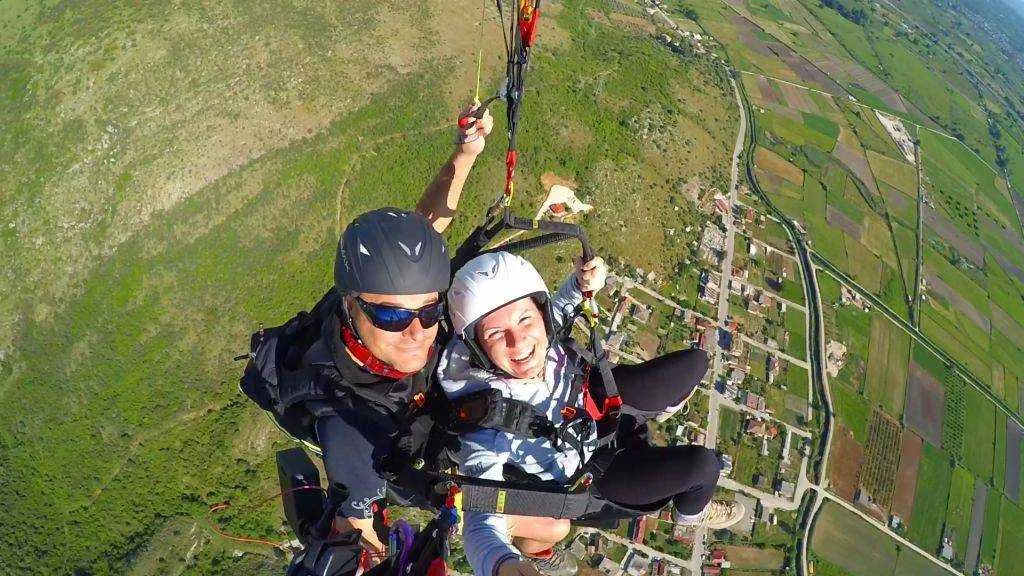 Tandem paragliding flight over Arta