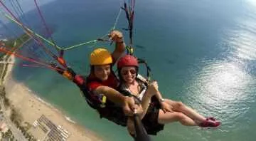 Tandem paragliding flight over the Rocks of Preveza